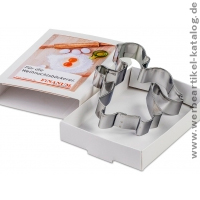 Backförmchen in Slide Box mit Standardmotiv, kleine Weihnachtsgeschenke. Backförmchen in Slide Box mit Standardmotiv, kleine Weihnachtsgeschenke.